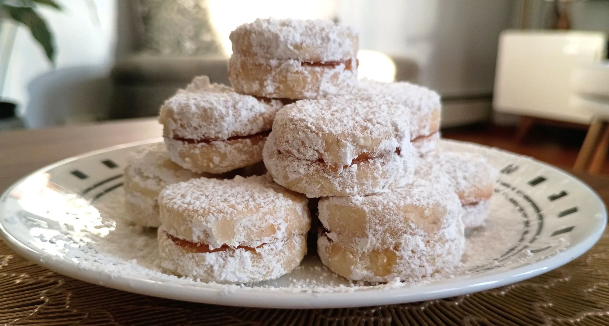 Perfectly bite-sized walnut shortbread cookie sandwiches that will melt in your mouth. Carefully put together with organic apricot jam filling and rolled in powdered sugar, these mini treats are sure to delight.