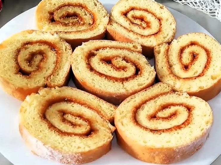 The jam roll is a light, fluffy sponge cake that is rolled with strawberry jam.